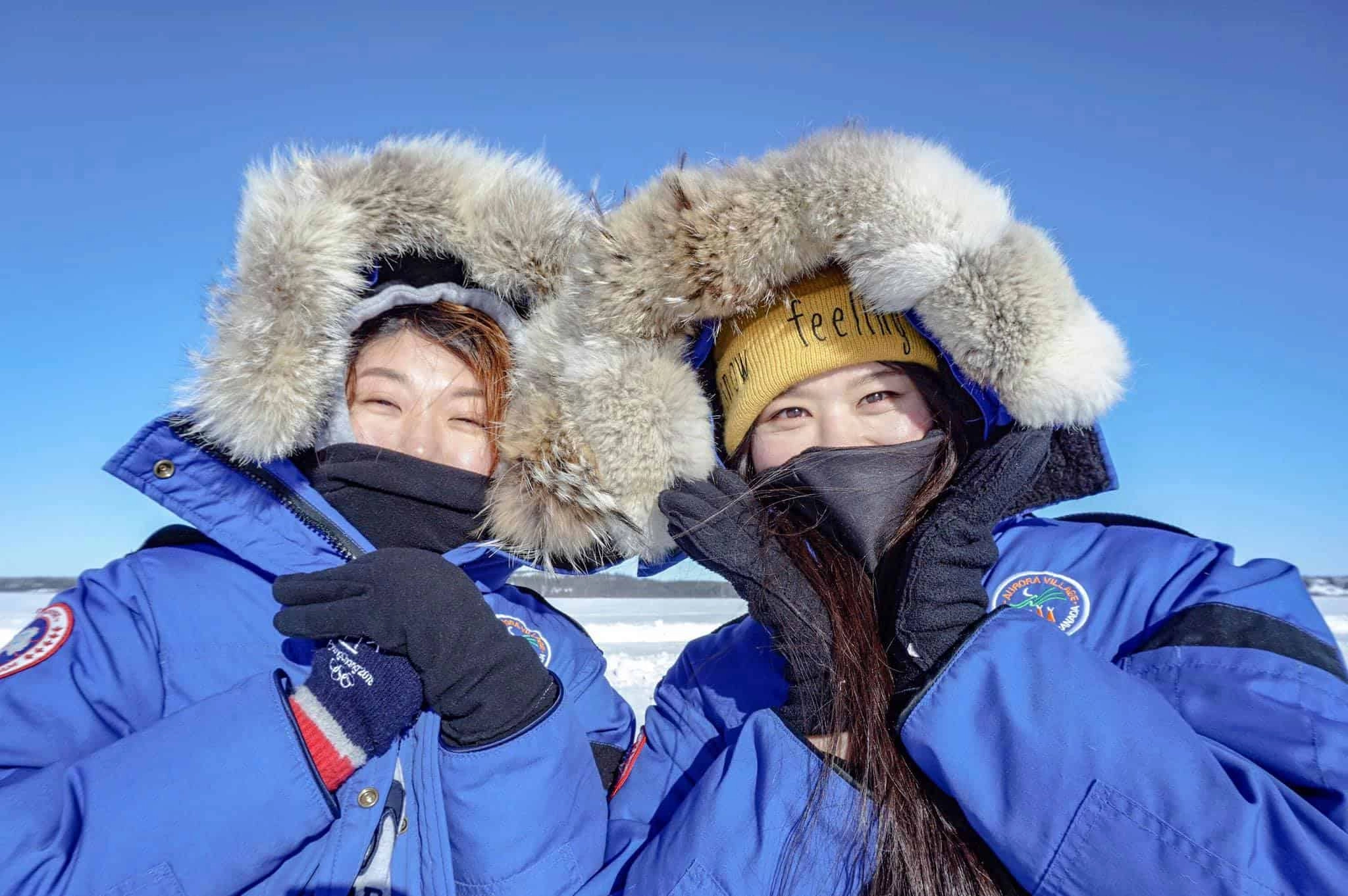 Aurora-Village-Yellowknife-Northwest-Territories-Canada-Aurora-Borealis-Northern-Lights-teepees-staff-cold