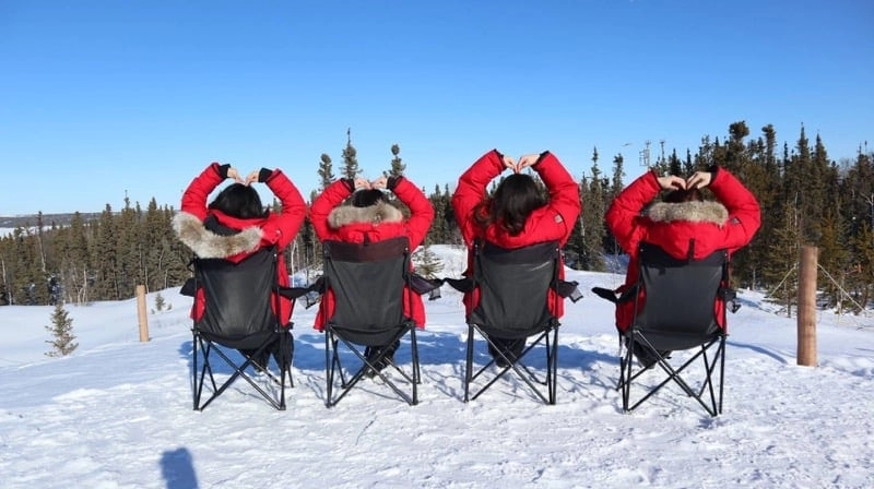 Aurora-Village-guides-seated