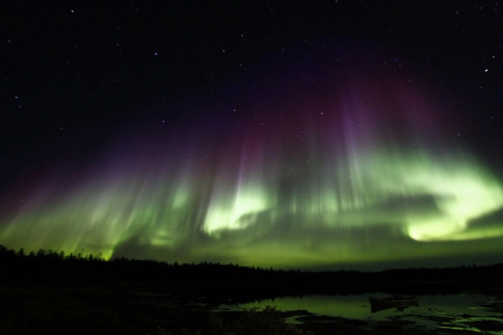 Aurora village yellowknife northwest territories canada aurora borealis northern lights summer nature nopeople landscape colourful green purple perfect hero insta