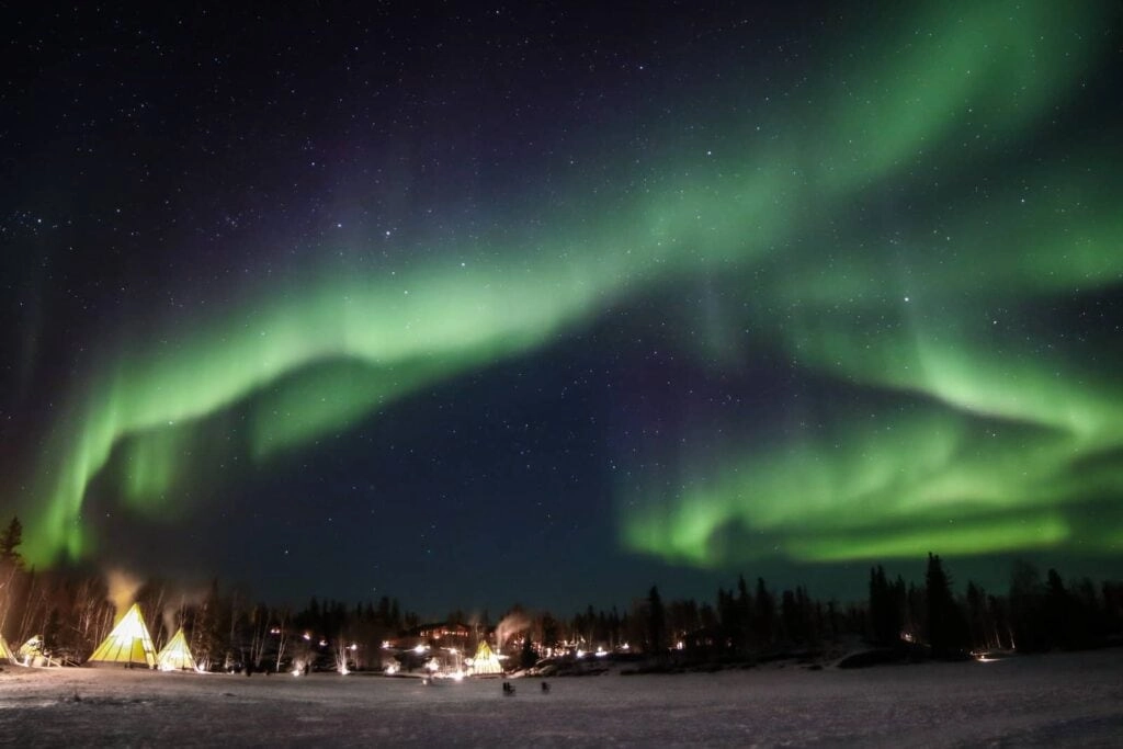 Aurora village yellowknife northwest territories canada aurora borealis northern lights teepees credit julian 0b2a1929