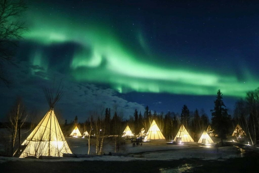 Aurora village yellowknife northwest territories canada aurora borealis northern lights teepees credit julian 0b2a2492