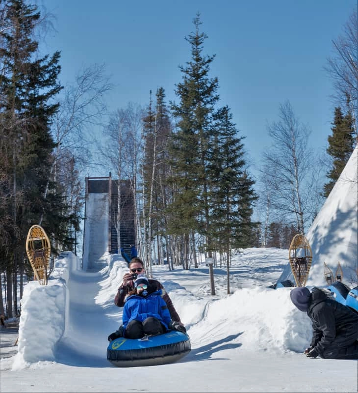 Giant slide aurora village winter