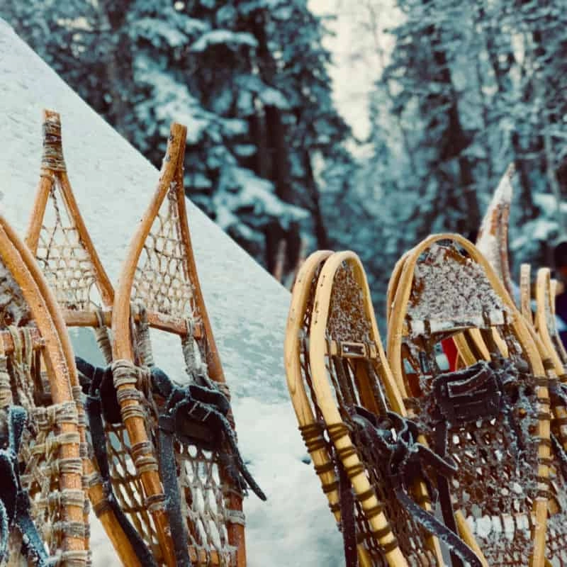 Instagram aurora village snowshoes teepee