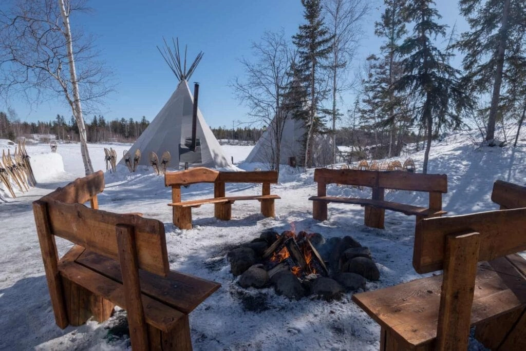 Urora village yellowknife northwest territories canada winter activities village fire daytime 1
